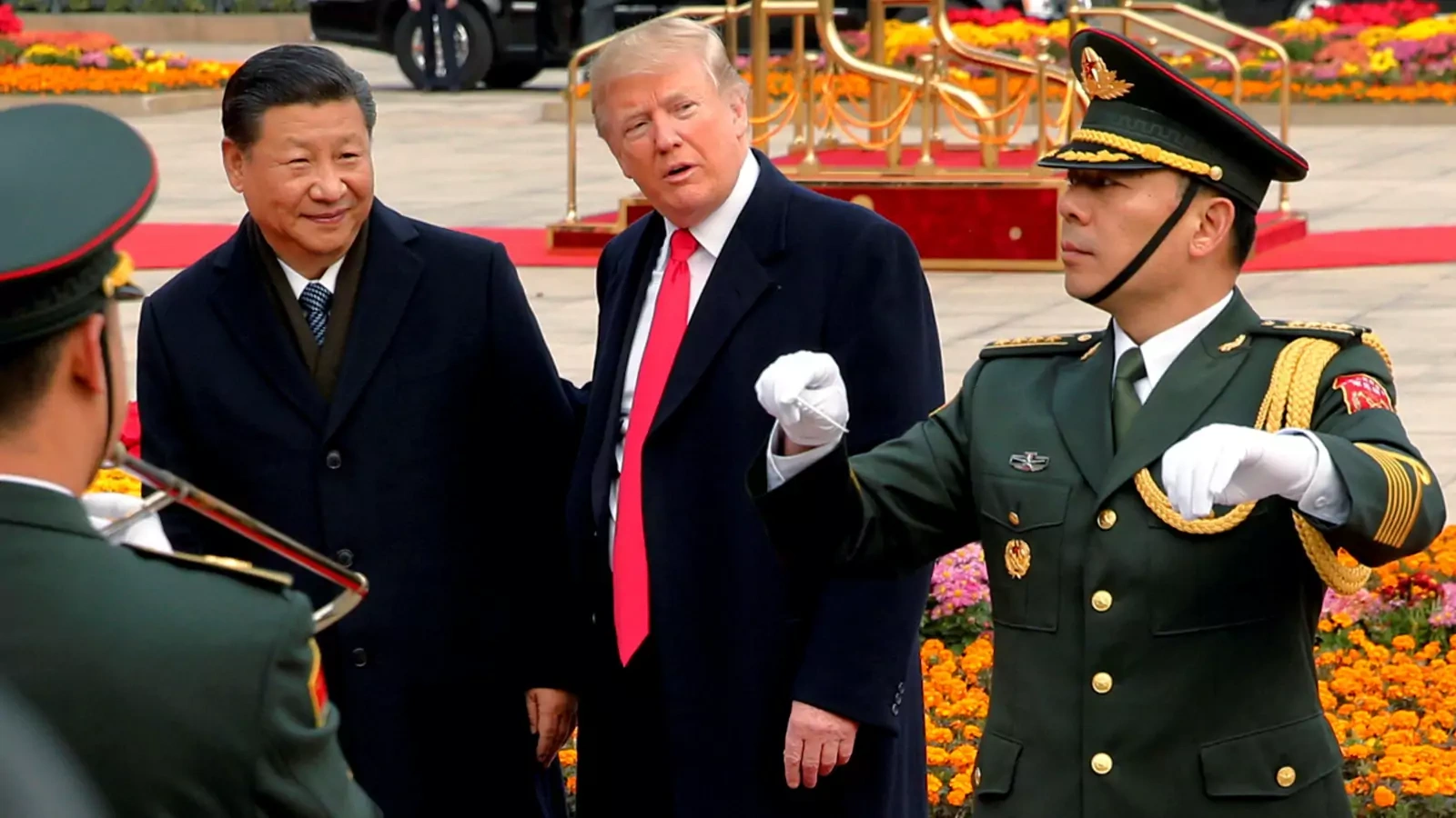 U.S. President Donald Trump takes part in a welcoming ceremony with China's President Xi Jinping in Beijing, China.