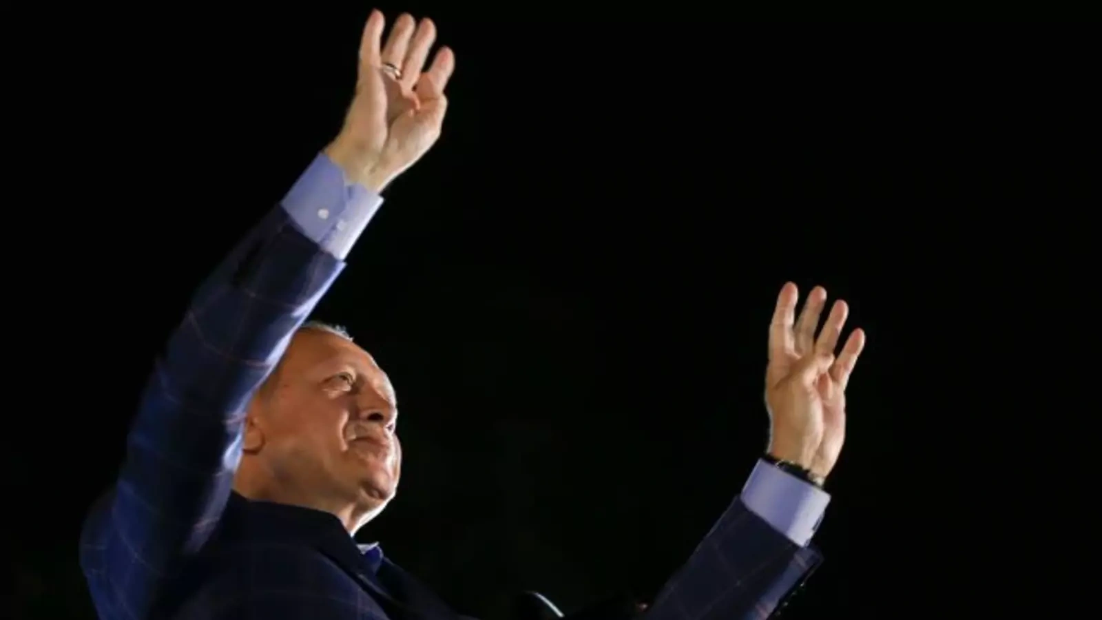 Turkish President Tayyip Erdogan greets his supporters in Istanbul, Turkey, April 16, 2017.