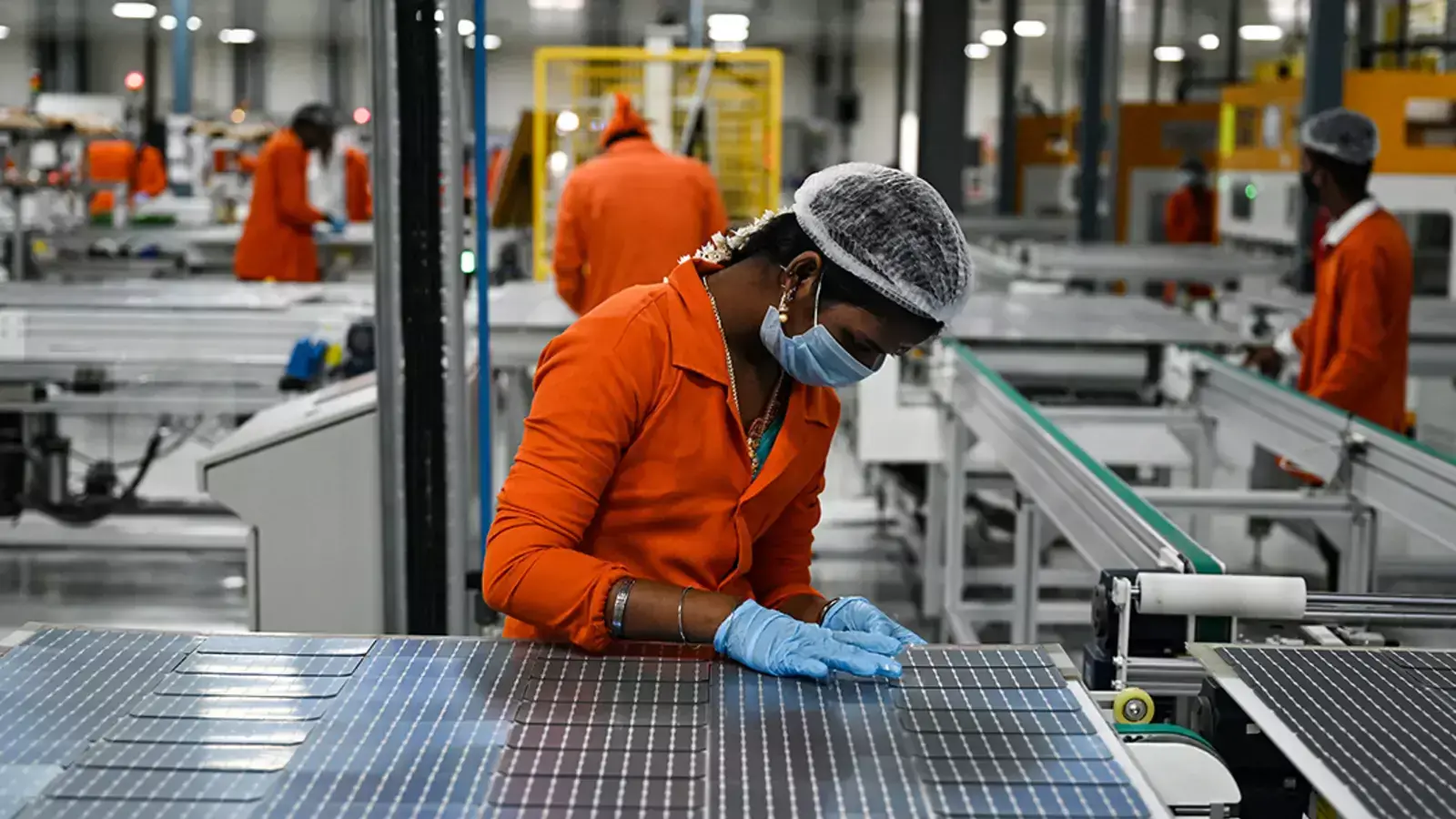 An employee connects solar cells at the Vikram Solar manufacturing plant in Oragadam, in the southern Indian state of Tamil Nadu. Currently, coal powers 70 percent of India’s electricity generation.