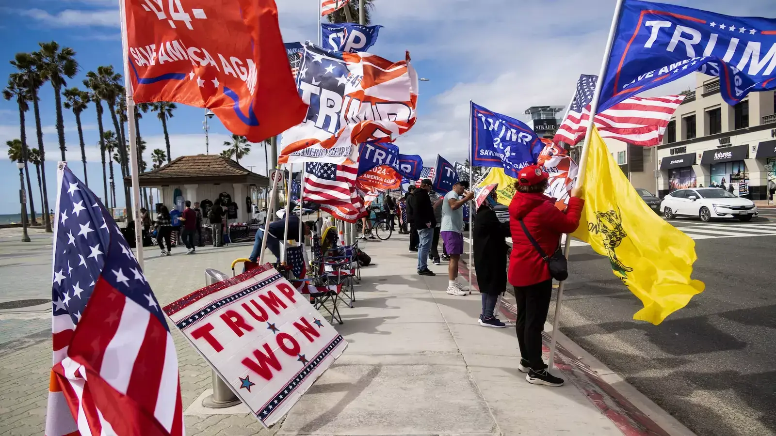 Supporters of Republican presidential candidate and former U.S. President Donald Trump gather, ahead of Super Tuesday, in Huntington Beach, California, U.S.