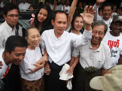 Ko Pyone Cho (C), one of the leaders of a 1988 student uprising, reunites with his family at Yangon International Airport in Yangon January 13, 2012. 