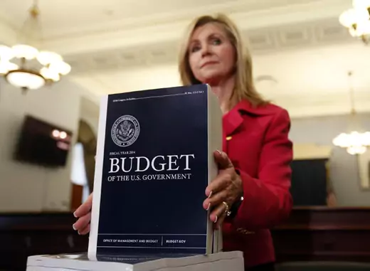 House Budget Committee member Marsha Blackburn (R-TN) displays a copy of  U.S. President Barack Obama's FY2014 budget proposal on April 10, 2013 (Kevin Lamarque/Courtesy Reuters).