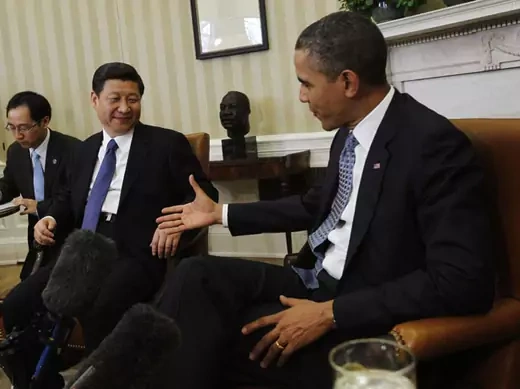 Barack Obama prepares to shake hands with Xi Jinping in the Oval Office (Jason Reed/Courtesy Reuters).