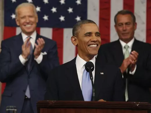 Vice President Biden and Speaker of the House Boehner applaud as President Obama finishes his State of the Union speech on Capitol Hill in Washington