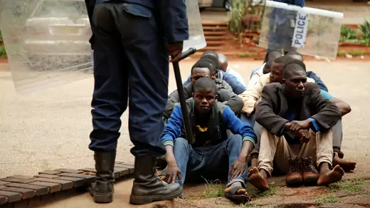 People arrested during protests wait to appear in the Magistrates court in Harare, Zimbabwe, January 16, 2019. 