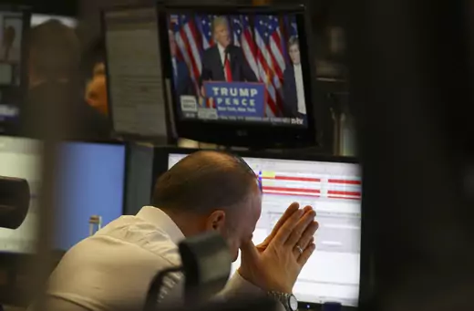 A trader at the stock exchange reacts to the election of Donald Trump in Frankfurt, Germany on November 9, 2016.