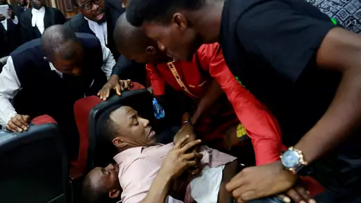 A fight breaks out as security personnel attempt to re-arrest Nigerian activist Omoyele Sowore at the Federal High Court in Abuja, Nigeria December 6, 2019.