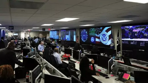 DHS election security workers monitor screens in November 2018.