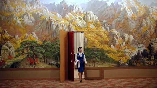An employee enters a room at a hotel in Mount Kumgang resort in Kumgang, North Korea, on September 1, 2011.