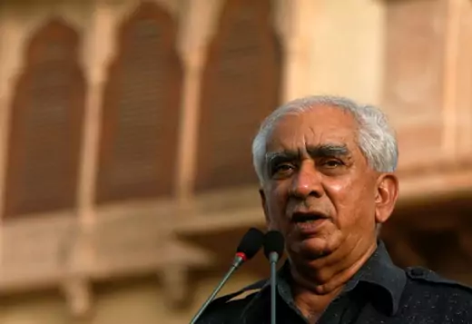 Jaswant Singh speaks at a microphone.