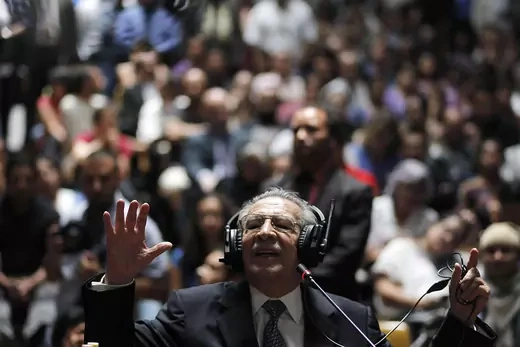 Former Guatemalan dictator Efrain Rios Montt gestures during his genocide trial