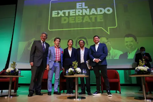 Enrique Gomez, Luis Perez, Ingrid Betancourt, Gustavo Petro, and John Milton Rodriguez pose during a debate on March 29, 2022, in Bogota, Colombia.