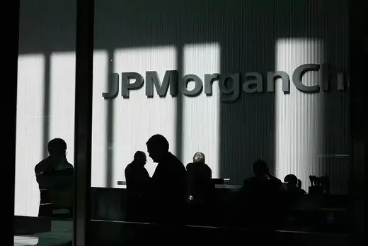 Photo showing  People standing inside the offices of JP Morgan Chase