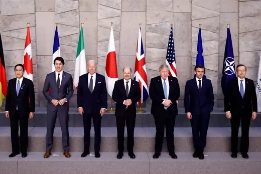 G7 leaders pose in front of their national flags for a family photo during a NATO summit on Russia's invasion of Ukraine at the alliance's headquarters in Brussels, Belgium on March 24, 2022.