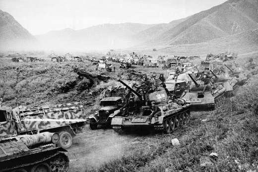 A Soviet tank unit crosses Manchuria's Great Khingan Mountain.