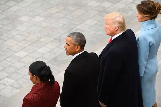 Former President Barack Obama and Michelle Obama stand with President Donald Trump and Melania Trump at the 2017 inauguration.