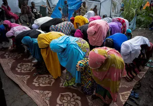 Internally displaced Congolese Muslim women attend Eid al-Fitr prayers in the Munigi camp site near Goma in the North Kivu province of the Democratic Republic of Congo, April 21, 2023.