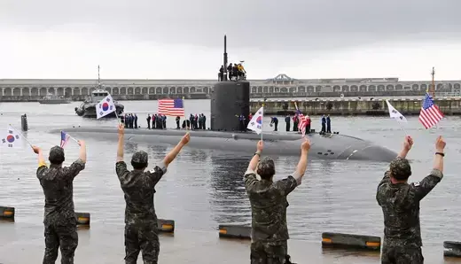 A U.S. nuclear-powered submarine is greeted by South Korean Navy soldiers upon its arrival at a naval base on Jeju Island, South Korea on July 24, 2023.