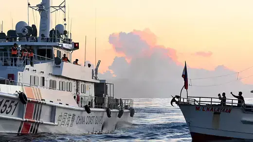 Chinese Coast Guard vessel blocks a chartered supply boat delivering provisions in the South China Sea.