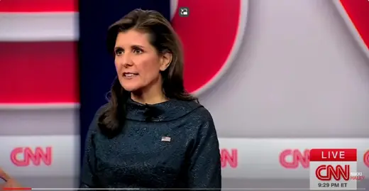 Nikki Haley as viewed in front of CNN banner.