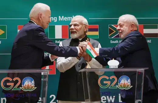 U.S. President Joe Biden, Indian Prime Minister Narendra Modi and Brazilian President Luiz Inacio Lula da Silva hold hands as they attend the launch of the Global Biofuels Alliance at the G20 summit in New Delhi, India, September 9, 2023.