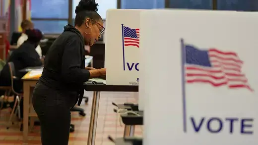 woman voting at a U.S. election