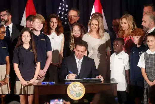 Florida Governor Ron DeSantis signs five state house bills into law after giving a press conference at Cambridge Christian School in Tampa, Florida on May 17, 2023.