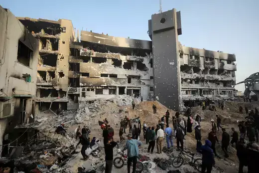 Palestinians inspect damage at Al Shifa Hospital in Gaza City, on April 1, 2024, after Israeli troops withdrew. 