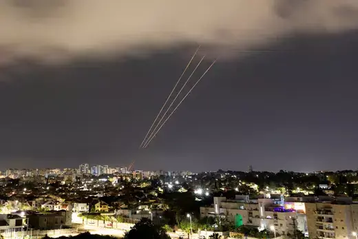 An Israeli missile defense system in Ashkelon, Israel, fires at incoming Iranian missiles and drones on April 14, 2024.