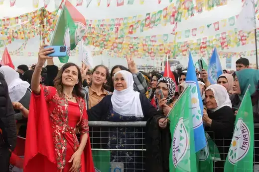 Gulistan Sonuk, pro-Kurdish Peoples' Equality and Democracy Party (DEM Party) Batman mayoral candidate, poses for a selfie with her supporters during a rally to celebrate Nowruz, which marks the arrival of spring, in Batman, Turkey March 20, 2024.