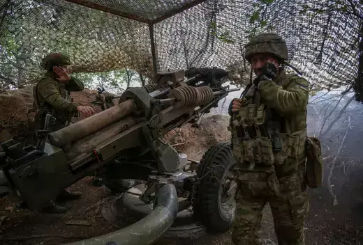 Ukrainian service members fire a L119 howitzer towards Russian troops, amid Russia's attack on Ukraine, in Donetsk region, Ukraine April 21, 2024.