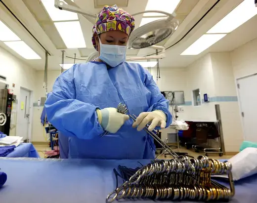 Surgical Tech Melissa Ellis prepares an OR room in the University of Mississippi Medical Center in Jackson, Mississippi October 4, 2013.