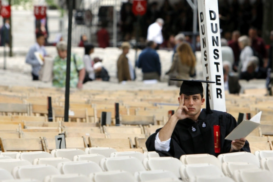 A graduating Harvard student waits for the start of commencement ceremonies in 2009. (Brian Snyder/Courtesy Reuters)