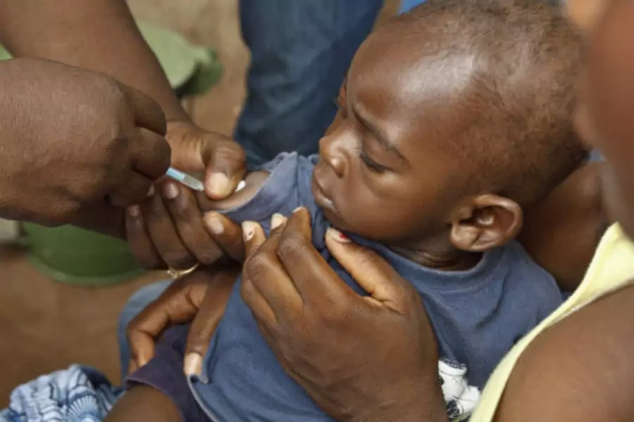 A boy is vaccinated against measles as part of a vaccination programme in Dodowa, Ghana on April 25, 2012 (Courtesy Reuters).