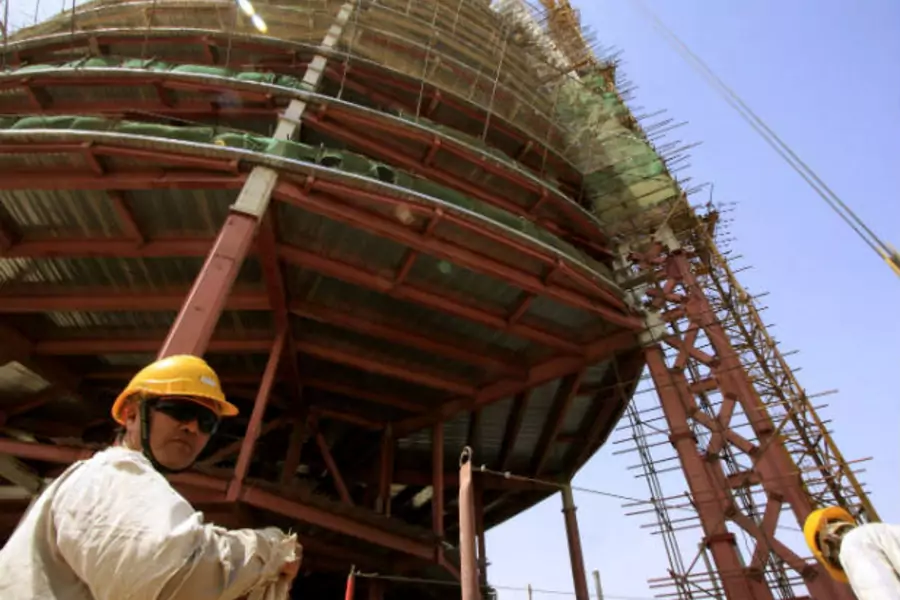 A Chinese engineer supervises work at a construction site in Khartoum, Sudan on February 16, 2009 (Mohamed Nureldin Abdallh/Courtesy Reuters).