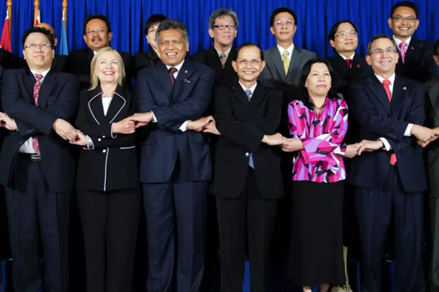 U.S. secretary of state Clinton poses with ASEAN leaders during a meeting at the ASEAN Secretariat in Jakarta September 4, 2012.