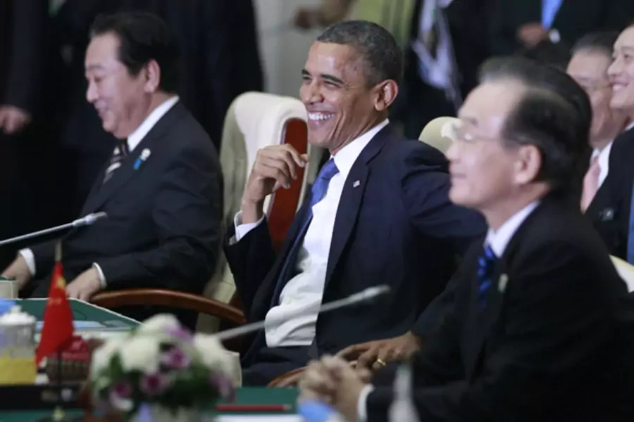 U.S. President Barack Obama attends the East Asia Summit plenary session in Phnom Penh alongside then Japanese prime minister Yoshihiko Noda and Chinese premier Wen Jiabao
