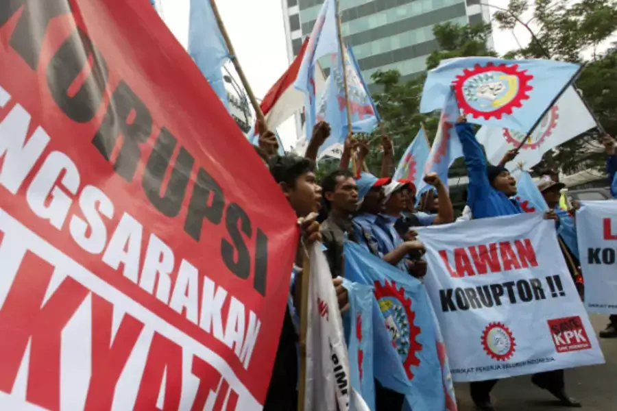 Protesters shout slogans during a rally to support the Corruption Eradication Commission (KPK) outside the KPK office in Jakarta on October 8, 2012 (Enny Nuraheni/Courtesy Reuters).