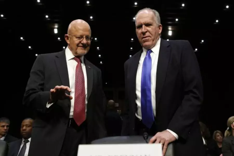 Director of National Intelligence James Clapper and CIA Director John Brennan testify before a Senate Intelligence Committee hearing on March 12, 2013 (Kevin Lamarque/Courtesy Reuters).