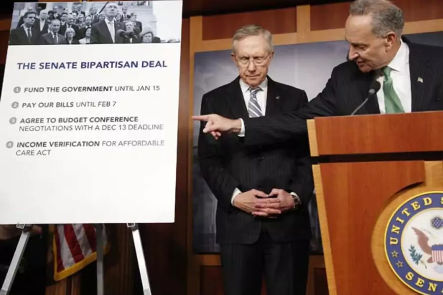 Senator Charles Schumer (D-NY) and Senate Majority Leader Harry Reid (D-NV) appear at a news conference after passage of a stopgap budget and debt legislation. (Jonathan Ernst/Courtesy Reuters).