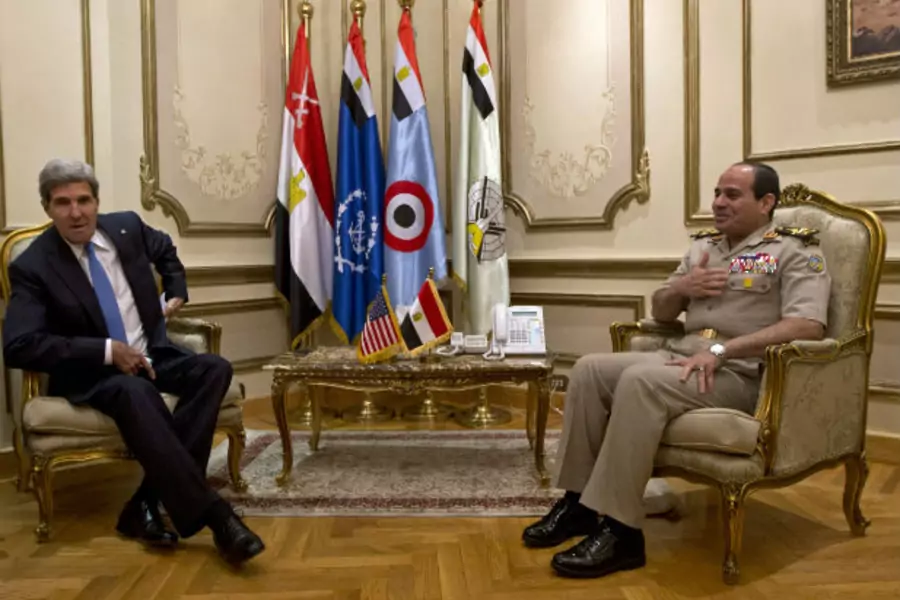 Secretary of State John Kerry (L) meets with Egyptian Defense Minister General Abdel Fatah al Sisi (R) in Cairo on November 3, 2013.