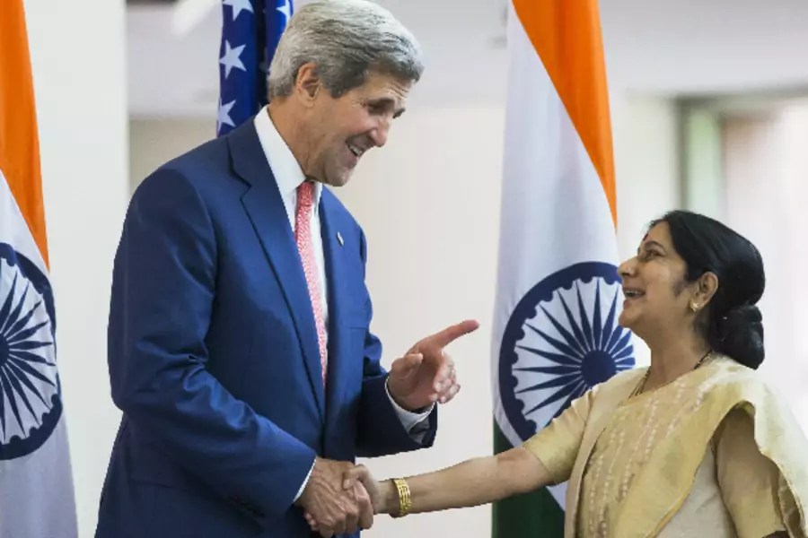 U.S. Secretary of State John Kerry (L) greets Indian External Affairs Minister Sushma Swaraj in New Delhi on July 31, 2014 (Lucas Jackson/Courtesy: Reuters).