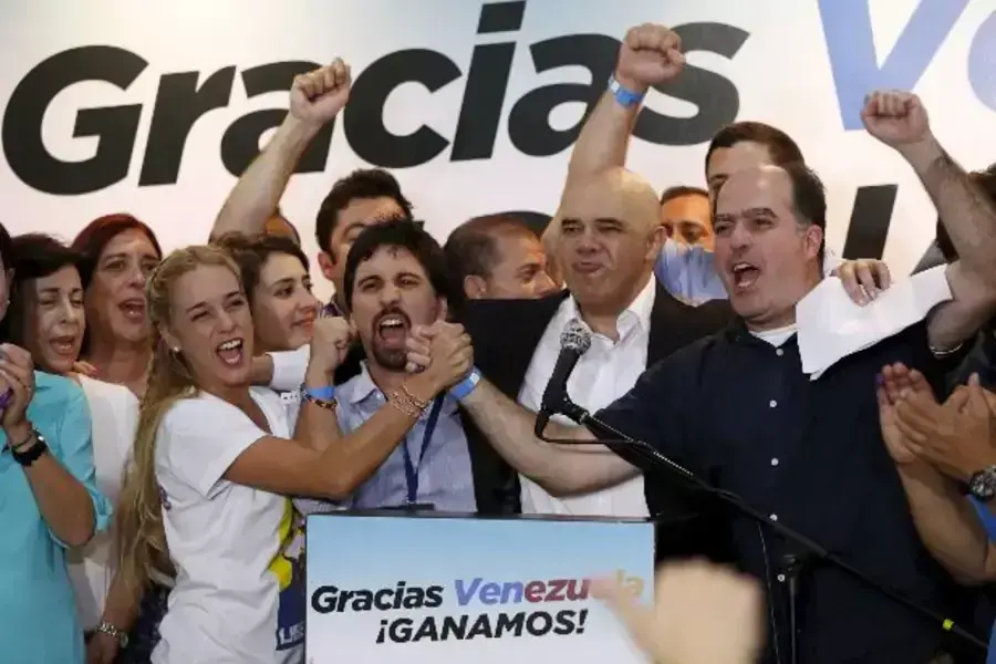 Lilian Tintori (centre L), wife of jailed Venezuelan opposition leader Leopoldo Lopez, celebrates next to candidates of the Ve... 16 years on Sunday, giving them a long-sought platform to challenge President Nicolas Maduro (Reuters/Carlos Garcia Rawlins).