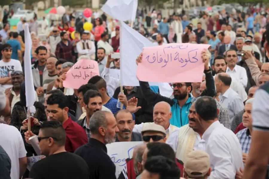 Supporters of the unity government shout slogans during a demonstration at Martyrs' Square in Tripoli (Hani Amara/Reuters).