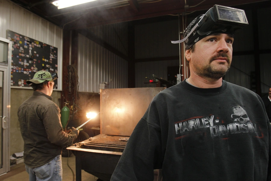 First year apprentice iron worker pauses during a class at Ironworkers Local 539 in Wheeling, West Virginia.