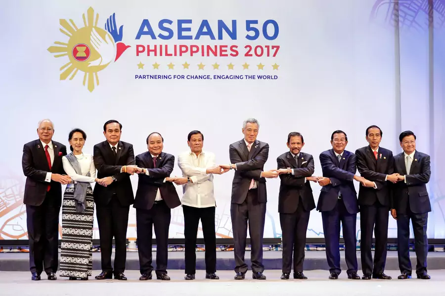 Association of Southeast Asian Nations (ASEAN) leaders link arms during the opening ceremony of the thirtieth ASEAN Summit in Manila, Philippines on April 29, 2017.
