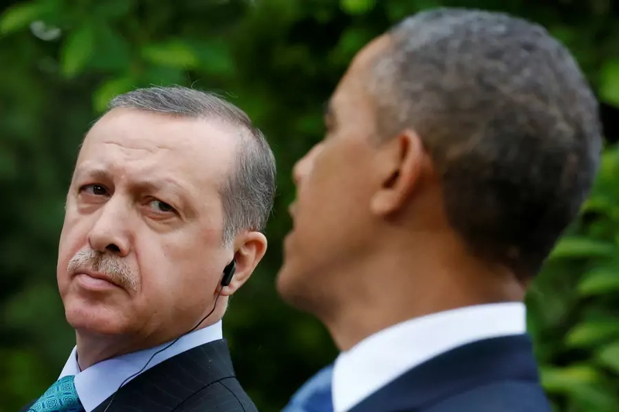 Turkish Prime Minister Recep Tayyip Erdogan (L) listens as U.S. President Barack Obama (R) addresses a joint news conference in the White House Rose Garden in Washington (Kevin Lamarque/Reuters).