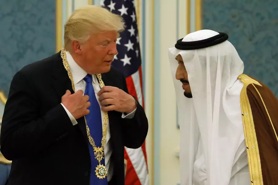 Saudi Arabia's King Salman bin Abdulaziz Al Saud (R) presents U.S. President Donald Trump with the Collar of Abdulaziz Al Saud Medal at the Royal Court in Riyadh (Jonathan Ernst/Reuters).