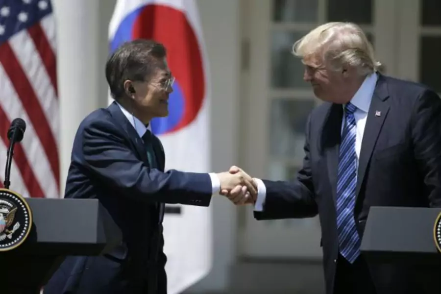 U.S. President Donald Trump (R) greets South Korean President Moon Jae-in prior to delivering a joint statement from the Rose Garden of the White House in Washington, U.S., June 30, 2017.