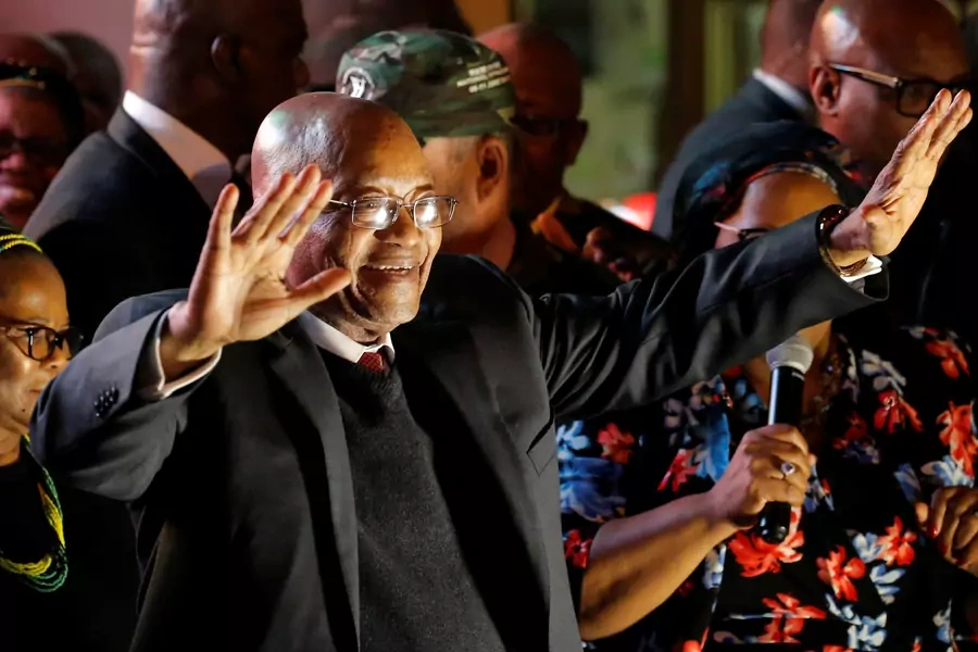 South Africa's President Jacob Zuma celebrates with his supporters after he survived a no-confidence motion in parliament in Cape Town, South Africa, August 8, 2017.